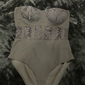 Black strapless bodysuit with cups for support